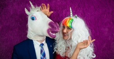 Do Unicorns Have Gender - Man and Woman in Unicorn Costumes Playing Around